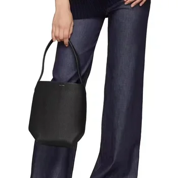 Женская сумка 2022 Новая сумка-мешок Большой емкости На одно плечо, ручная кожаная сумка, женская повседневная однотонная сумка Изображение